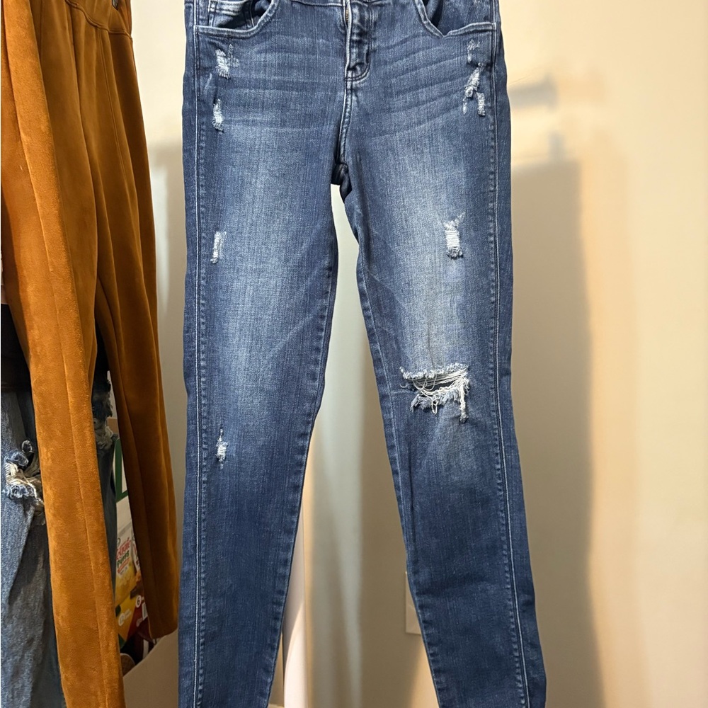 Distressed Blue Jeans